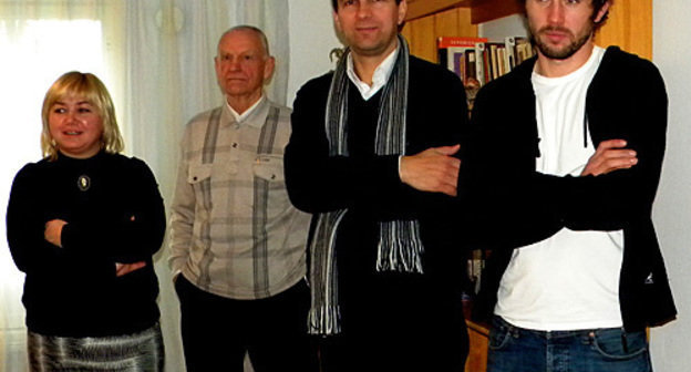 Human rights defenders in social village (SOS-village) in Vilnius. Left to right: Algirdas Endryukaitis, former MP of Lithuanian Seym, now teacher at the SOS-village; Audrius Natkevitsius and human rights defender Mantas Kvedaravichus. November 6, 2010. Photo by the "Caucasian Knot"