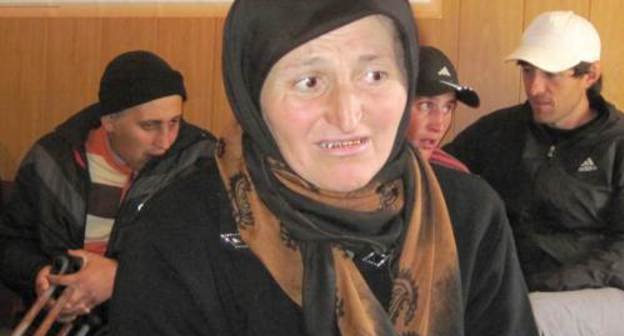 In the foreground: Uzlipat Magomedova, mother of Dalgat Yusupov, who received brain contusion after power agents' beating. In the background on the left: Magomed Isaev, who was also beaten by power agents, Dagestan, Tsuntin District, Khutrakh village, October 8, 2011. Photo provided by an eyewitness