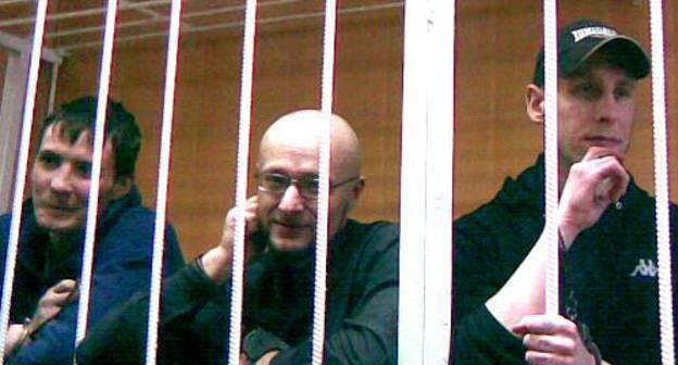 Defendants in the case on mass riots in Manege Square in December 2010 Kirill Unchuk, Ruslan Khubaev and Igor Berezyuk in the Tver District Court of Moscow before sentencing, October 28, 2011. Photo by Yulia Buslavskaya for the "Caucasian Knot"