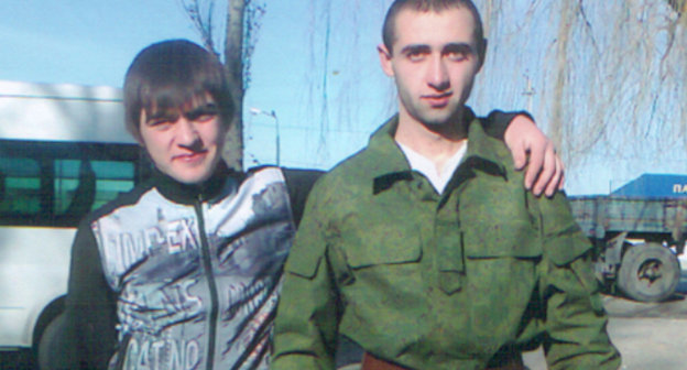 Taulan Gochiyaev (right) on departure to his military unit, December 2010. Photo from his family archive