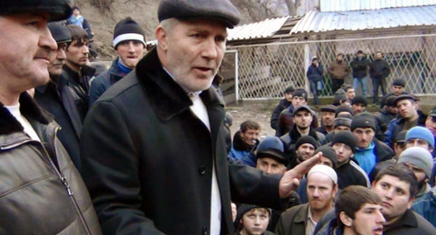 Village of Gimry Untsukul District of Dagestan. On January 14, 2012, the head of the village Aliaskhab Magomedov (center) speaks at a rally against the CTO (counterterrorist operation). Photo by Shamil Magomedov, http://gimry.ucoz.com
