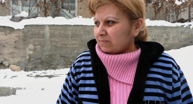 Shushanik Margaryan, a resident of Yerevan district of Sari Tag, tells about her house hit by a landslide. Armenia, Yerevan, February 17, 2012. Photo by Armine Martirosyan for the "Caucasian Knot"