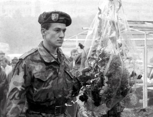 Abkhazian volunteers laying flowers at the boulder set in honour of the casualties victims of the 1992-1993 Georgian-Abkhaz conflict; Nalchik, Abkhazian Square, 1996, Courtesy of the magazine "Archives and Society", No. 18