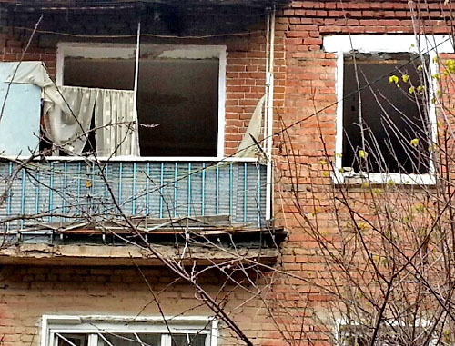 Smashing of a two-story house at No. 21 Rabochaya Street began prior to eviction of tenants. In the photo: window openings without frameworks - they were removed by the workers. Ingushetia, Karabulak, November 18, 2013. Photo courtesy of the tenants of the house
