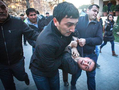 Police detains youth activists at the protest action in Baku on December 29, 2013. Photo by Aziz Karimov for the "Caucasian Knot"