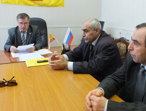 Members of the organizing committee of the "Extraordinary Congress of Dagestani Nations" Ruslan Rasulov, Gadzhi Mirzaev and Nurmagomed Gazimagomedov in the office of the Dagestani branch of the party "A Just Russia" after an attempt of holding a meeting has been disrupted. Makhachkala, April 19, 2014. Photo by Patimat Makhmudova for the "Caucasian Knot"