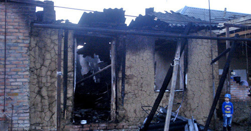 House burned down by law enforcers in the village of Yandi, Achkhoi-Martan District, December 7 2014. Photo provided by the HRC "Memorial" press-service. 