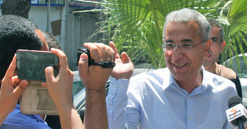 Intigam Aliev (to the right) during his detention. Baku, August 8, 2014. Photo by Aziz Karimov for the "Caucasian Knot".