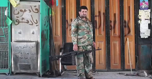The soldier of the FSA (Free Syrian Army) in the street of Aleppo. Syria. Photo https://ru.wikipedia.org