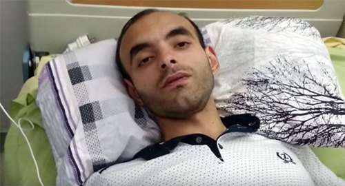 Rasim Aliev in the hospital, August 8, 2015. Photo: screenshot from video MOV 0003, https://www.youtube.com/watch?t=10&v=wigU5a7vRHM