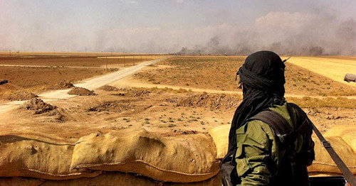 War in Syria. Photo: Kurdish YPG Fighter https://www.flickr.com