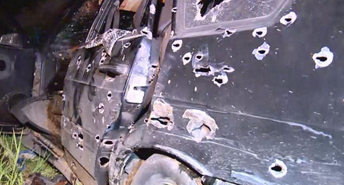 Car body perforated by bullet holes. Photo:  http://nac.gov.ru/kontrterroristicheskie-operacii/v-dagestane-neytralizovany-glavar-i-dva-bandit-0.html