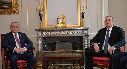 The meeting of Azerbaijani President Ilham Aliev and Armenian President Serzh Sargsyan. Photo: Sputnik Armenia http://sputnikarmenia.ru/armenia/20151219/1439998.html#ixzz48zAklhvx. Twitter/Vladimir Akopyan