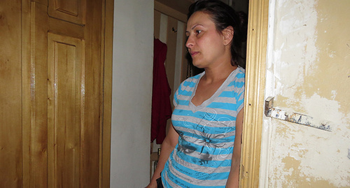 Inga Grigoryan, owner of the apartment in Saroyan Street, 10, flooded as a result of heavy rain in Stepanakert. Photo by Alvard Grigoryan for the ‘Caucasian Knot’. 