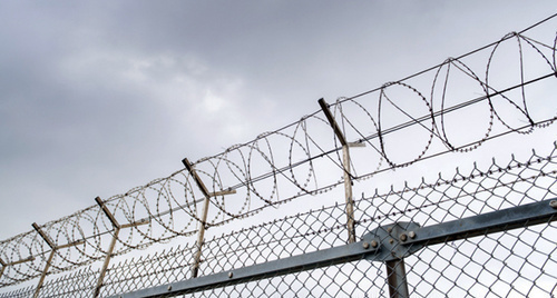 A prison fence. Photo: Thinkstock/Fotobank.ru