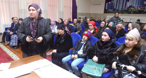 Relatives of missing persons get DNA passports, Grozny, March 2015. Photo by Kazbek Vakhaev, http://www.grozny-inform.ru/news/society/58610/