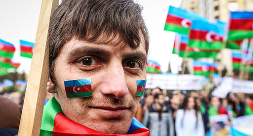 A participant of the protest action in Baku. Photo by Aziz Karimov for the "Caucasian Knot"