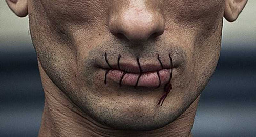 Artist Petr Pavlensky stitches up his mouth in protest against persecution of Pussy Riot group, Saint Petersburg, July 2012. Photo: http://saint-petersburg.ru/m/spb/old/311648/?mobile_redirect=false
