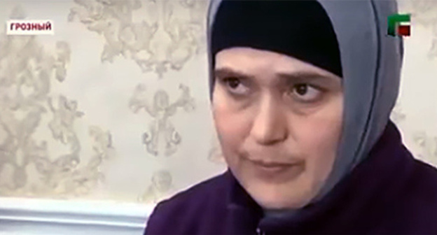Maret Zanzulaeva at the meeting with Chechen Parliament Speaker Magomed Daudov. Still frame from the report by Chechen State TV and Radio Company "Grozny",  https://www.youtube.com/watch?v=TQFU5CHUi6c