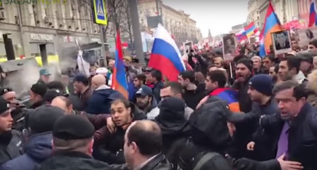 Conflict between representatives of Azerbaijani and Armenian delegations at "Immortal Regiment" action in Moscow, May 9, 2017. Screenshot of YouTube video: https://www.youtube.com/watch?v=DzytTF3mso0