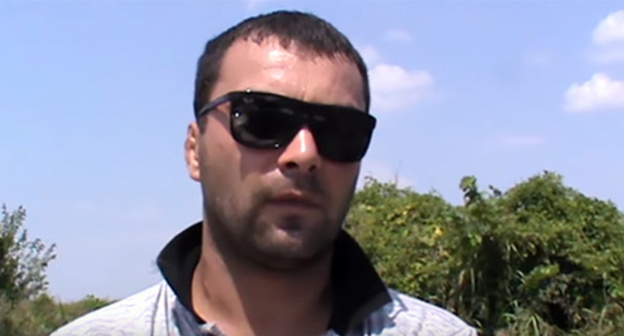 A participant of the conflict in the Morzokh village in the Urvan District of Kabardino-Balkaria. Photo: screenshot of the video https://www.youtube.com/watch?v=4MfNONAlydU