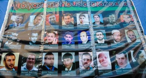 A poster with the photos of the political prisoners in Azerbaijan, used at the opposition rally in Baku on April 8, 2017. Photo by Aziz Karimov for "Caucasian Knot"