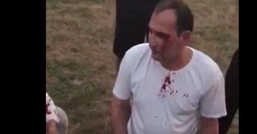 Screenshot of video depicting beatings of Ingush people in Beslan, https://www.facebook.com/100012891757330/videos/pcb.1883230695328397/339361459836910/?type=3&theater&ifg=1