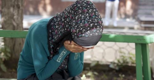 Crying woman, Grozny. Photo: RFE/RL