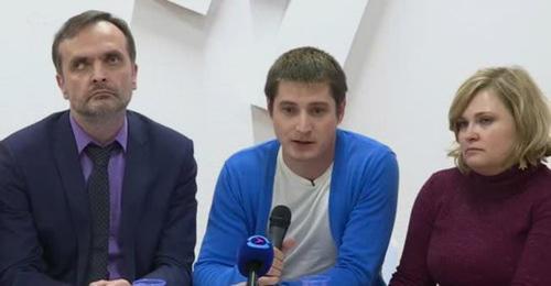 Igor Kochetkov, Maxim Lapunov, Yelena Milashina. Photo: RFE/RL