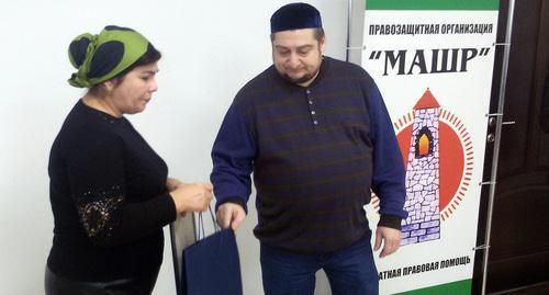 Head of human rights organization 'Mashr' Magomed Mutsolgov hands "Civil Society Heroes" contest diploma to Pyatimat Dalieva. Photo by Timur Abadiev for the Caucasian Knot. 