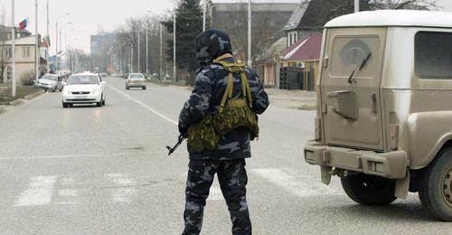 Law enforcer, Grozny. Photo: REUTERS/Stringer (RUSSIA - Tags: CIVIL UNREST CONFLICT MILITARY)