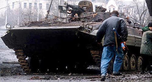 Many of Timur Mutsuraev's songs are dedicated to Chechen war. Photo of Russian IFV destroyed in Grozny, January 1995 made by Mikhail Yevstafiev, https://ru.wikipedia.org/wiki/Первая_чеченская_война