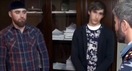 Two Grozny residents Magomed Abdurzaev and a 16-year-old teenager. Screenshot from video by Chechen GTRK, https://www.youtube.com/watch?v=8KkUbIsSxW4