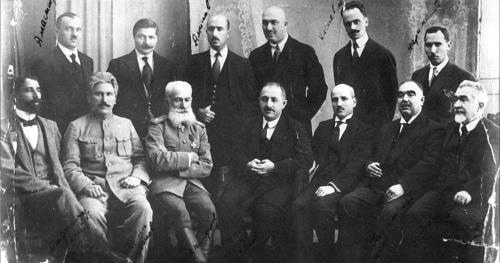 Cabinet Ministers of the Azerbaijan Democratic Republic (ADR). From left to right, sitting: A. Safikurdsky, H. Melik-Aslanov, S. Mekhmandarov, N. Usubbekov, M. Y. Djafarov, A. Gasanov and и A. N. Dostakov; standing: H. Amaspyur, R. Z. Kaplanov, A. Aminov, D. Gadjinsky, V. V. Klenovsky, N. Narimanbekov. Photo: https://www.ourbaku.com