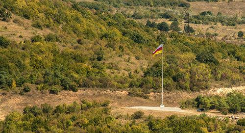 The flag of South Ossetia on the border with Georgia. Photo Sputnik / Alexey Kovalyov https://sputnik-ossetia.ru/South_Ossetia/20180530/6485569.html