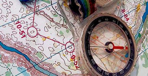Compass and map. Photo: Chief Department for Chuvash Republic of the Ministry of Emergency Situations of Russia