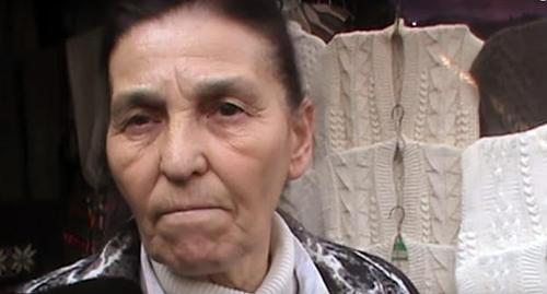 Seller at the Sheep Wool market in Nalchik. Screenshot from video: https://www.youtube.com/watch?time_continue=277&v=WLwj5-d8ldE