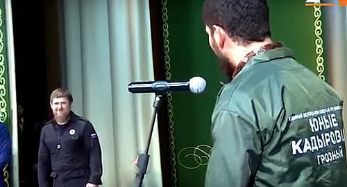 Ceremony of schoolchildren's joining the "Kadyrov Youngsters" organization. Screenshot from video 'Chechnya Today', https://www.youtube.com/watch?time_continue=144&v=jYXF8HviD4Q