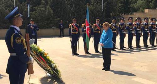 Angela Merkel at the official ceremony in Baku. Photo: REUTERS / Andreas Rinke
