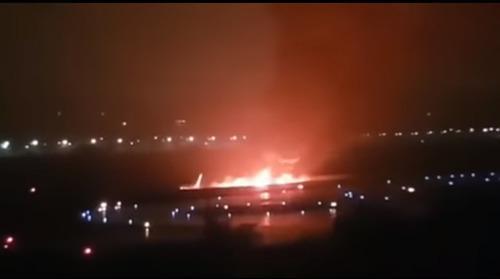 Burning plane in Sochi airport. Screenshot from video: https://youtu.be/W94S9Zo40RQ