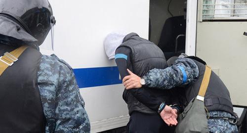 Law enforcers during detention. Photo by the press service of the Russian National Anti-Terrorism Committee http://nac.gov.ru/