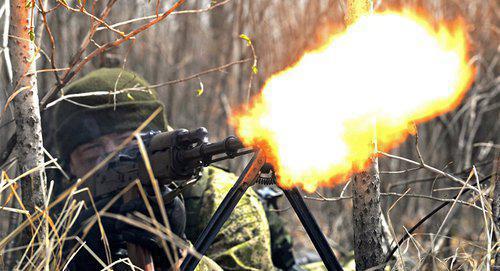 Machine-gun firing. Photo: © Sputnik / Igor Onuchin, https://sputnik.az/karabakh/20181118/417964678/Cbhd-silahlar-yen-susmayb.html
