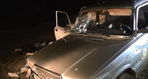A shelled car in a highway in the Karabudakhkent District of Dagestan. Photo by the press service of the Russian National Antiterrorist Committee http://nac.gov.ru/hronika-sobytiy/v-dagestane-v-hode-boestolknoveniya-neytralizovany-troe-banditov.html#&amp;gid=1&amp;pid=2"