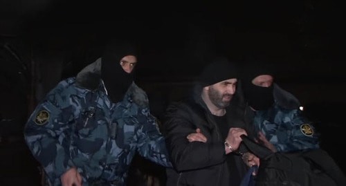 Members of Gagiev's grouping convoyed to Moscow. Screenshot from video posted by Russia's Investigating Committee, https://www.youtube.com/watch?v=iUnKTdYE0Q4