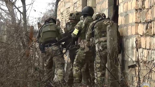 A special operation. Photo by the press service of the Russian National Antiterrorist Committee from the report on the killing of a militant in the village of Belidji, February 19, 2019. http://nac.gov.ru 