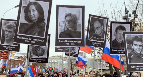 Participants of the march in memory of Boris Nemtsov hold portraits of the killed journalists, human rights defenders and opposition activists, Moscow, February 24, 2019. Photo by Oleg Krasnov for the Caucasian Knot