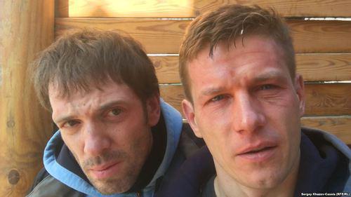 Andrei Kostyanov and Sergey Khazov-Kassia after being attacked. Photo: RFE/RL