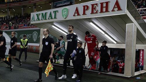 Football players enter the field at the "Akhmat Arena" Stadium on April 13, 2019. Photo by the press service of the "Lokomotiv" FC ttps://www.fclm.ru/ru/publications/news/19888
