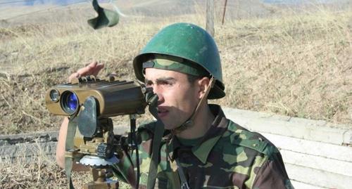 A soldier of the army of Nagorno-Karabakh at the military positions. Photo by the Ministry of Defence for Nagorno-Karabakh http://www.nkrmil.am