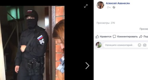 Rosgvardia officer during search in the office of the "Ecological Watch for North Caucasus". Screenshot of the Facebook post by Alexei Avanesyan, http://www.facebook.com/100005066893432/videos/pcb.1254162881429263/1254177024761182/?type=3&theater 